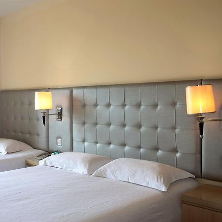 Qingdao Renjia Bussiness Hotel Extérieur photo