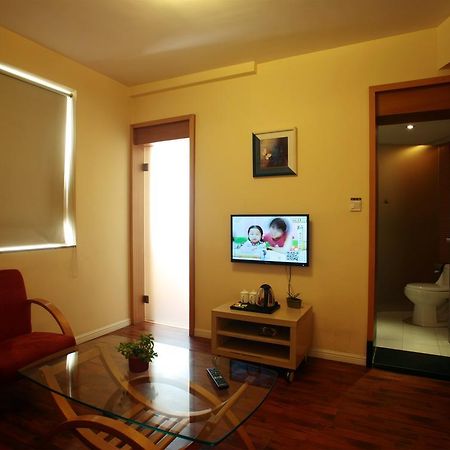 Qingdao Renjia Bussiness Hotel Extérieur photo