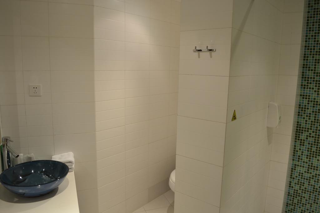 Qingdao Renjia Bussiness Hotel Extérieur photo