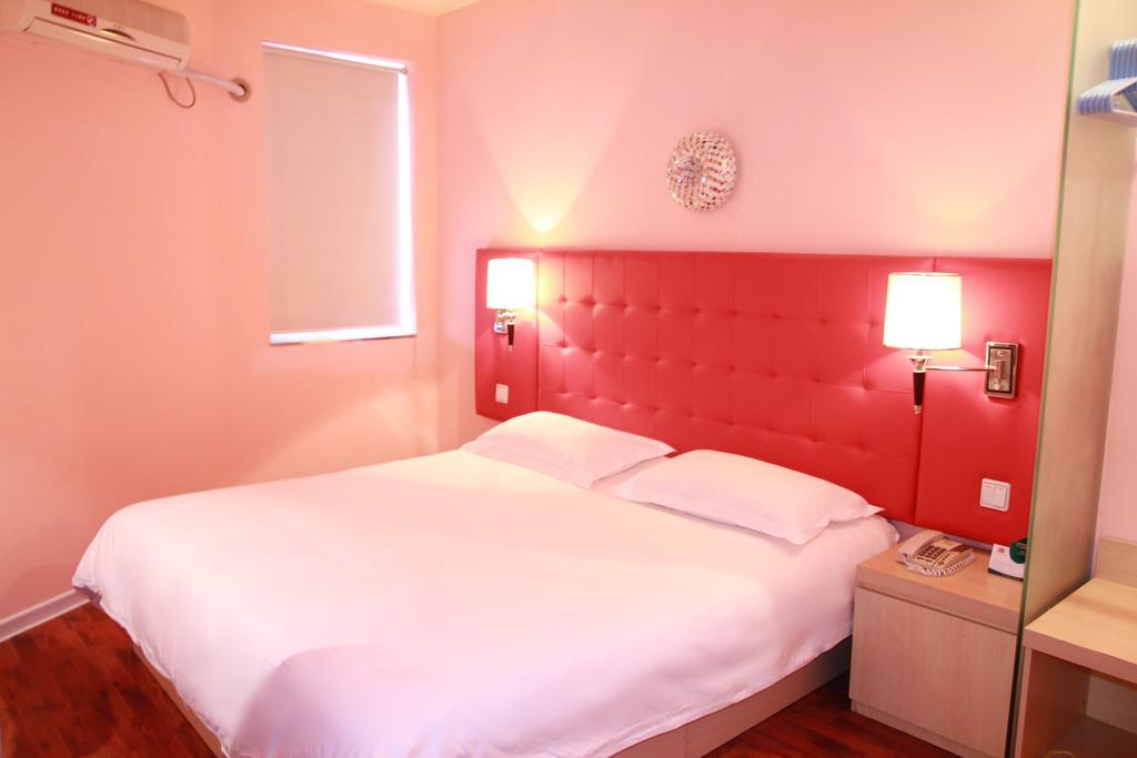 Qingdao Renjia Bussiness Hotel Chambre photo
