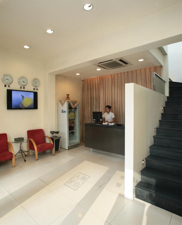 Qingdao Renjia Bussiness Hotel Extérieur photo