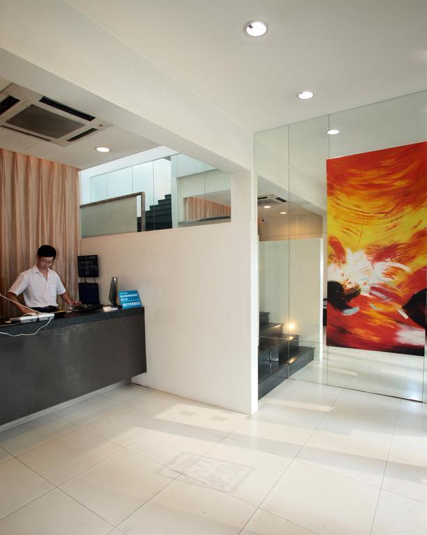 Qingdao Renjia Bussiness Hotel Extérieur photo
