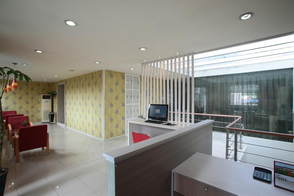 Qingdao Renjia Bussiness Hotel Extérieur photo