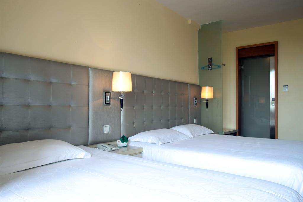 Qingdao Renjia Bussiness Hotel Extérieur photo