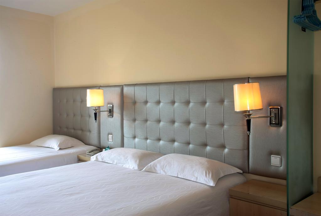 Qingdao Renjia Bussiness Hotel Extérieur photo