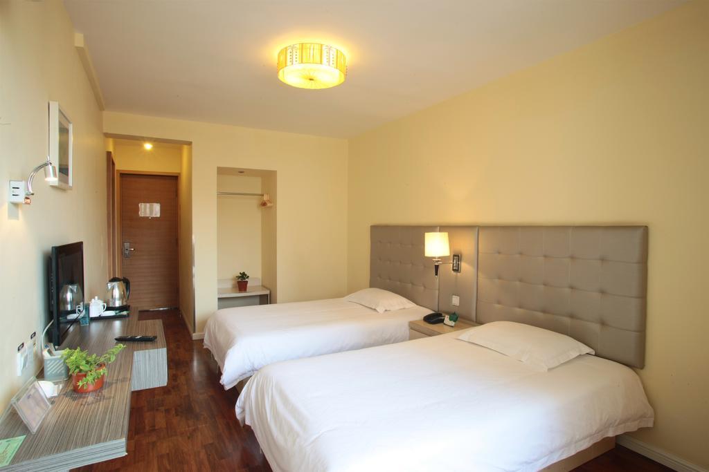 Qingdao Renjia Bussiness Hotel Extérieur photo