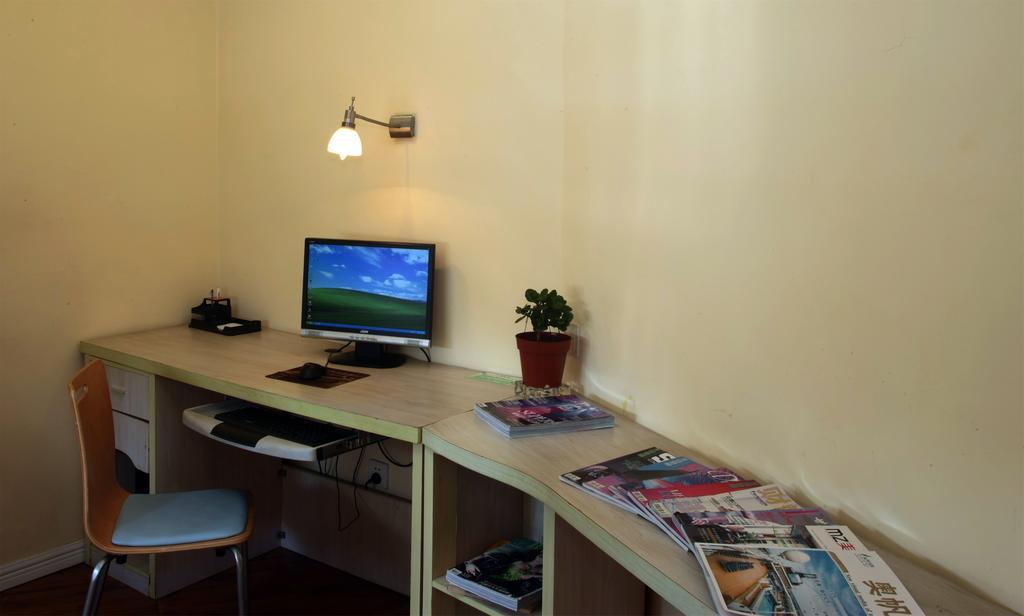 Qingdao Renjia Bussiness Hotel Extérieur photo